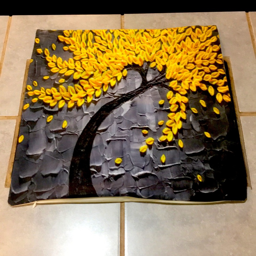 Throw pillow cover with zipper closure.